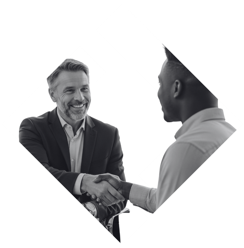 Happy financial advisor shaking hand of another person.